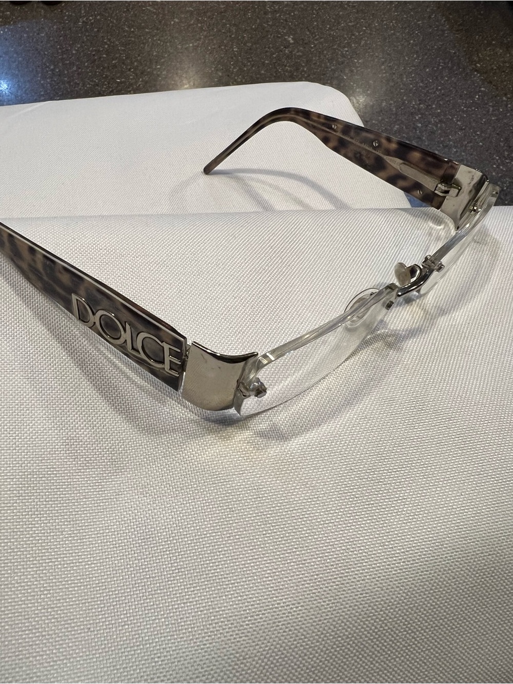 Dolce & Gabbana Clear Rimless Glasses prescription with Brown Animal Print